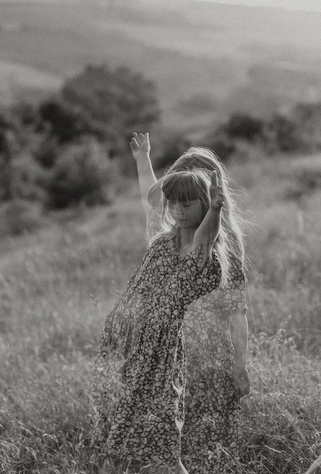 Child playing in a meadow